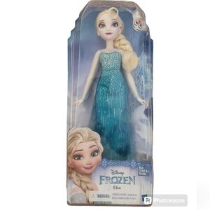 Disney Elsa Doll. Disney Frozen. Barbie. Frozen figure.